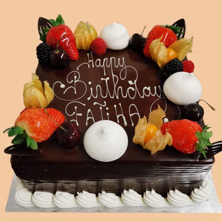 Halal Vegetarian Square Dark Chocolate Cake With Fruits And Macarons On