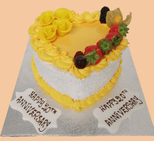 Anniversary Heart Shape Yellow Theme Fresh cream cake
